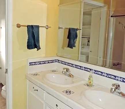 Rear Bath leads to Laundry and Rear Patio