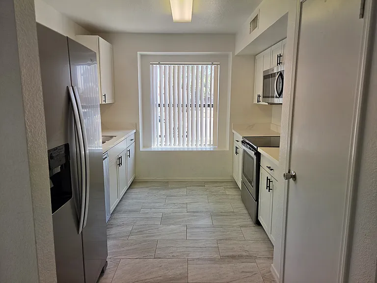 8728 W John Cabot Rd — Photo 7