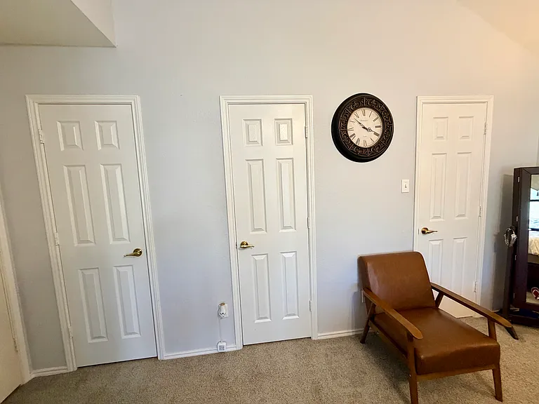 master bedroom- hers and his closets