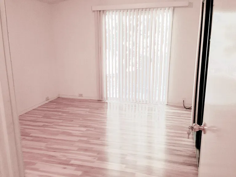 Master bedroom with patio door private access to back yard