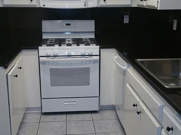 kitchen with new oven and dishwasher
