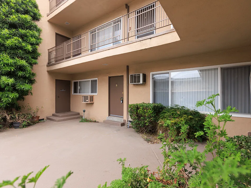 Inner Courtyard showing Front Apartment Door