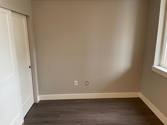 Flex space large enough for a desk, futon, and/or peloton
