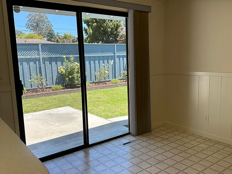 The dining area opens from the kitchen.