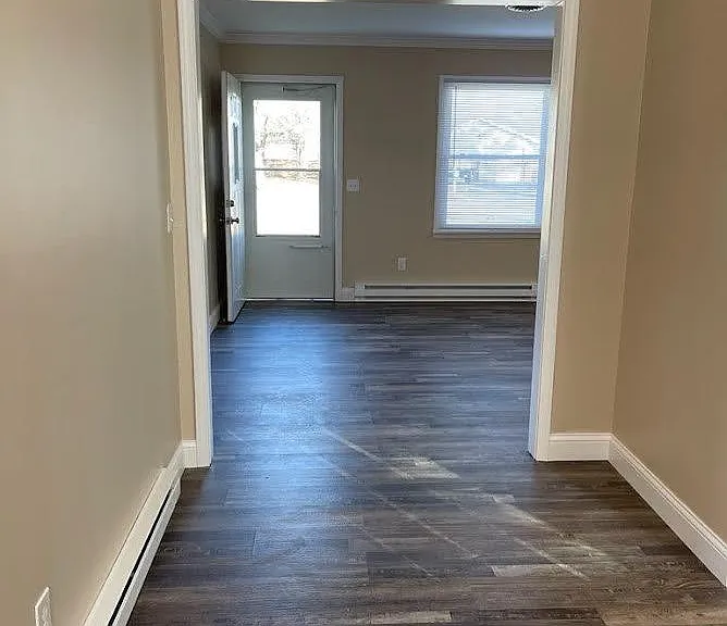 All new flooring, baseboards & crown moulding.