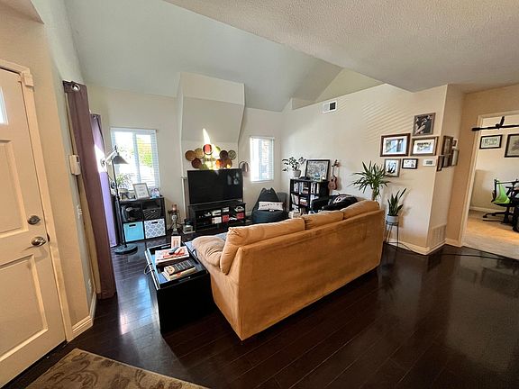 Living room with vaulted ceilings