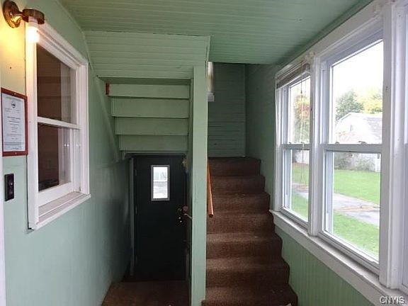Covered porch for first and second floor units!