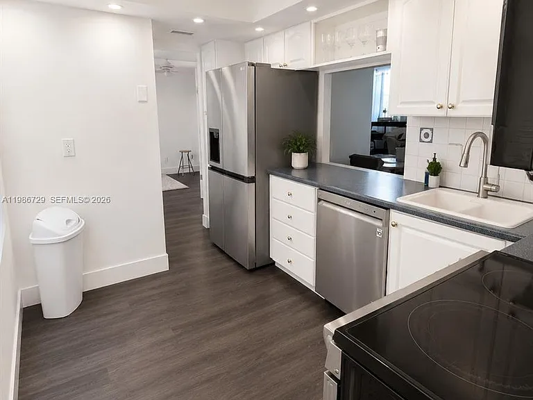299 NW 52nd Ter #X — Photo 6