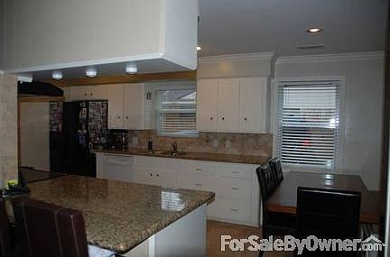 Granite and travertine in the kitchen