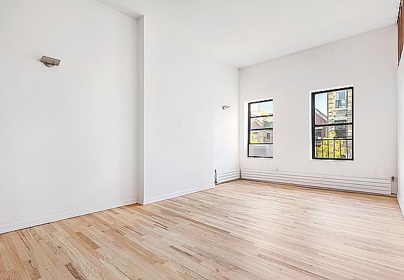 3rd image of 72 E 3rd St APT 5C