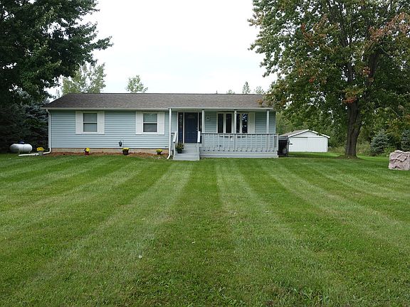 It has a Freeland address,Williams twp and Bay City Western Schools. It is layed out in such a way that you can add an attached garage and then have an outbuilding.The deer come out of the woods and eat apples from the apple tree in the back yard.