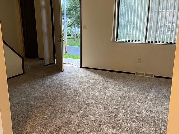 Living room with brand new carpeting