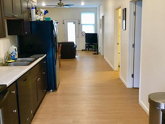 Front door leading to kitchen