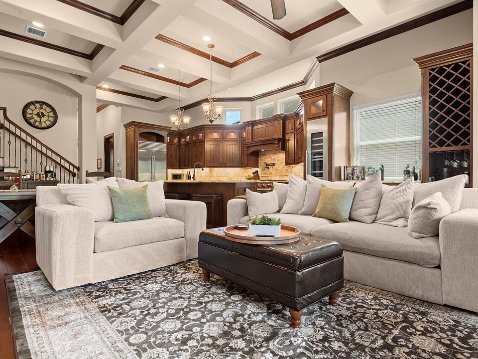 Gorgeous family room with surround sound. Bose speakers on every floor of the house for bluetooth listening. Big Screen TV.