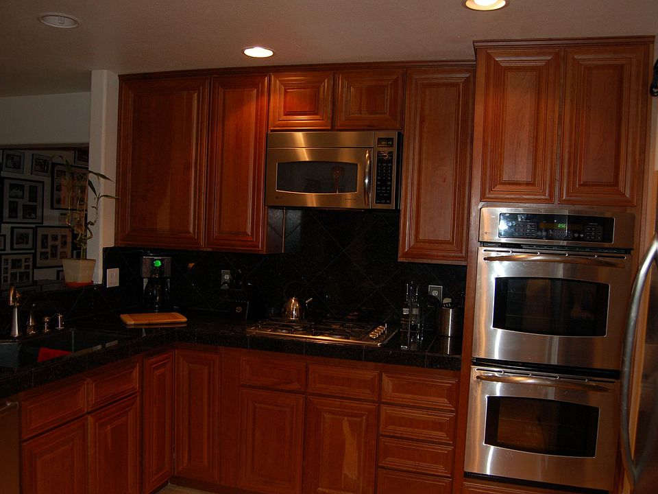 cherry wood cabnets through the whole house