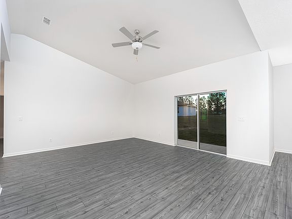 A sliding in the family room leads to the back yard