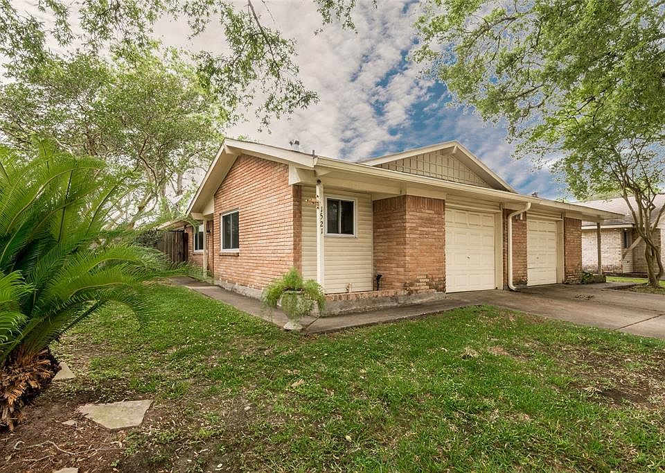 This lovely townhome has an attached one car garage!