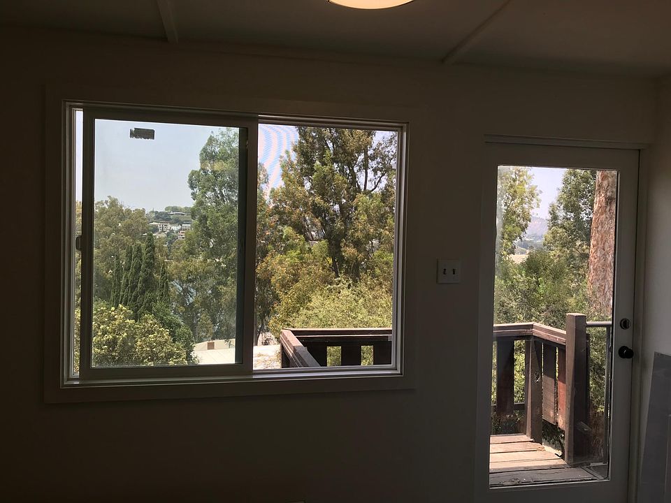 View from studio - note: old deck pictured; new deck will be 10x6 and extend past the left side of window. Ready 9/1.