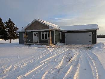 Built in 2009 By Bullock Creek Building Trades!! Full, partially finished basement and a 2.5 attached garage.  Desirable open floor plan with gorgeous hardwood flooring in the living room and kitchen. Full bathroom off the master bedroom. Main floor laundry. City water and the assessment has been paid in full. Large one acre lot. Inviting front covered porch. Close to Bullock Creek High School.