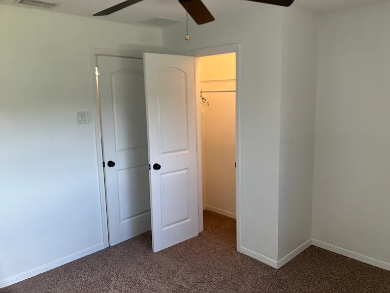 Third bedroom photo 2 of 3 showing closet
