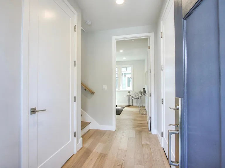 First floor entrance, leading to the high-ceiling bedroom