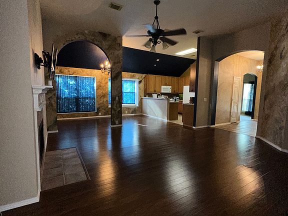 Living and dining area from bedroom hallway