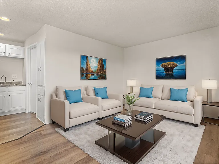 Inviting living room, virtually staged to highlight modern furniture, bright accents, and a warm, open layout. Inviting living room, virtually staged to highlight modern furniture, bright accents, and a warm, open layout.