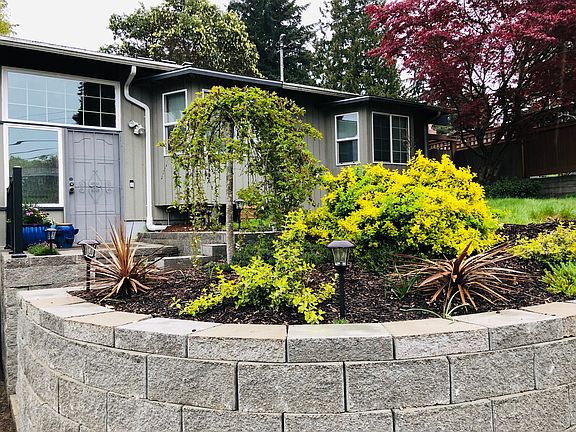 View of house pulling into the driveway