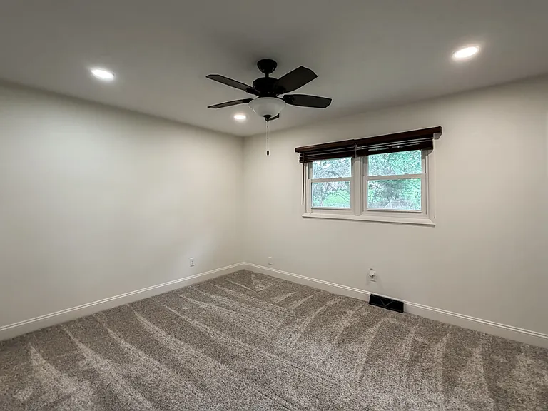 Primary Bedroom with 3/4 Bath and Walk In Closet