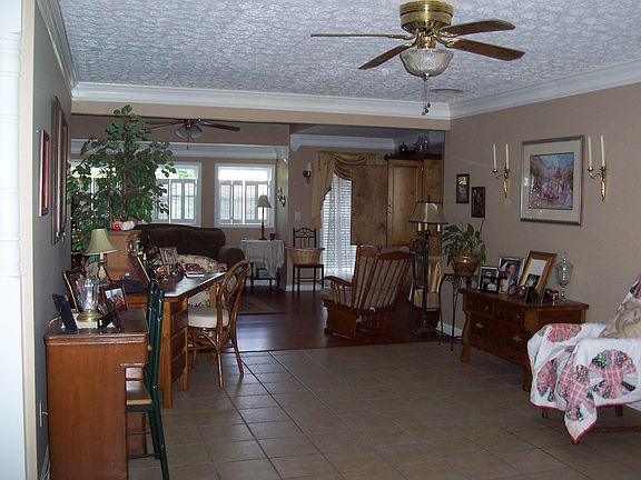 Oversized tile foyer welcomes your guests.