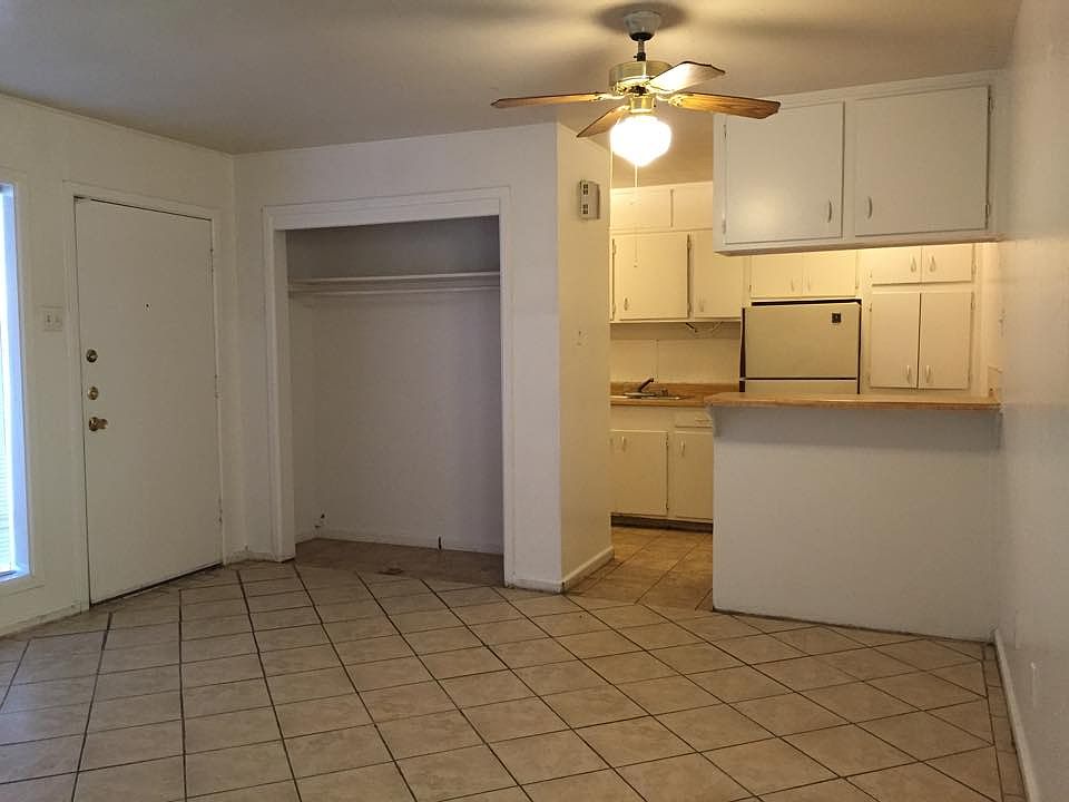 Living room with view to kitchen