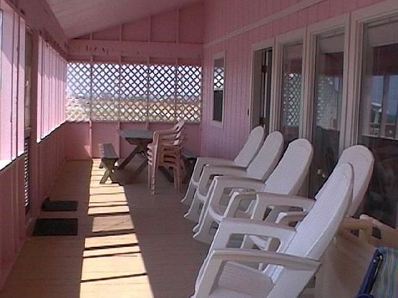 Screened porch with picnic table