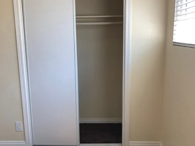 Bedroom #1, Closets are spacious and Windows are extra Large with Modern Blinds. ceiling fan.