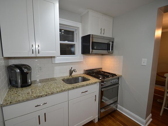 Kitchen with granite counter tops and stainless steel applia