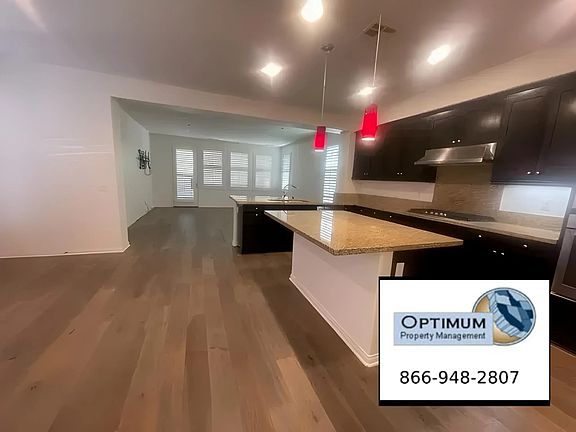 Kitchen with dining area and living room
