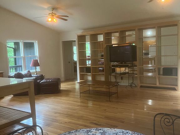 A beautifully made bookcase with entertainment center included.