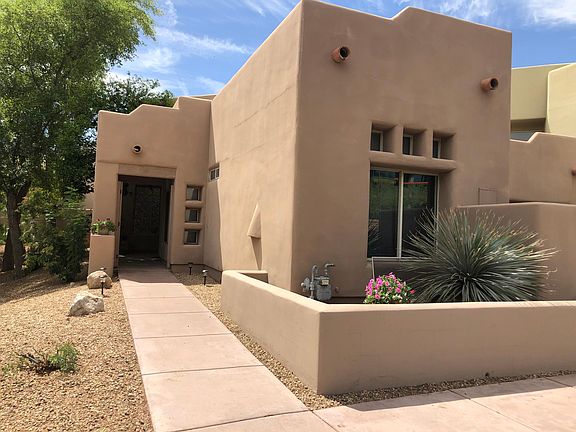 Gate leads to courtyard and entryway. Extra privacy as this home is an end unit.