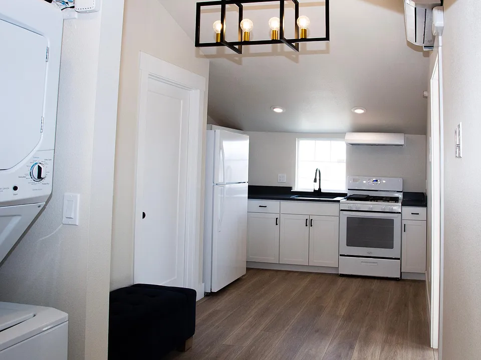 1351 Terrace, Unit 300 2 Bedroom Loft beauty with oversized bedrooms and exposed beam ceilings. Watch campus from your kitchen sink.