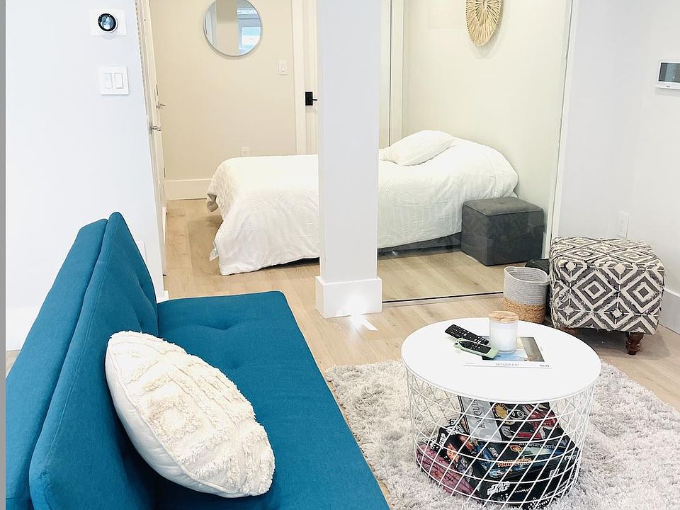 Open living room/bedroom design allows for light to flow throughout the apartment.