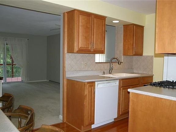 The Kitchen design also includes a built-in eating area as well as a pass-through to the Living Room!