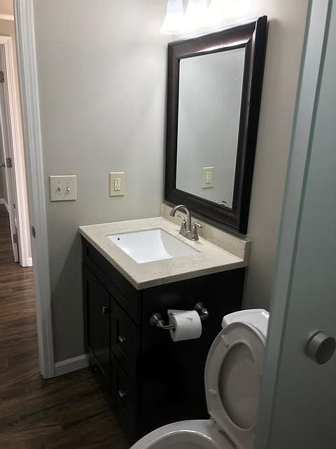 Bath with tub and shower