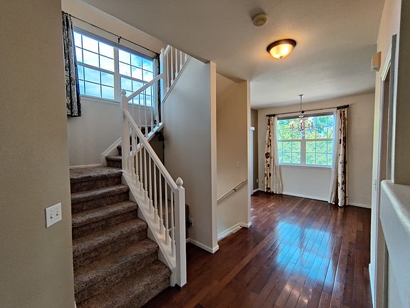 Stairway, reading nook, and dining room