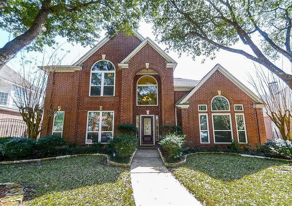 The mature landscaping enhances the beautiful curb appeal!