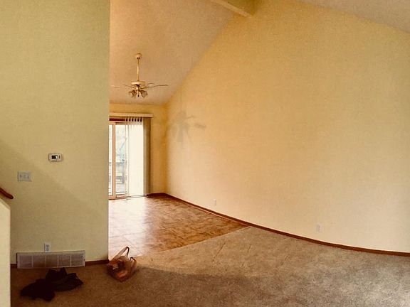 Newer carpet and open ceilings.