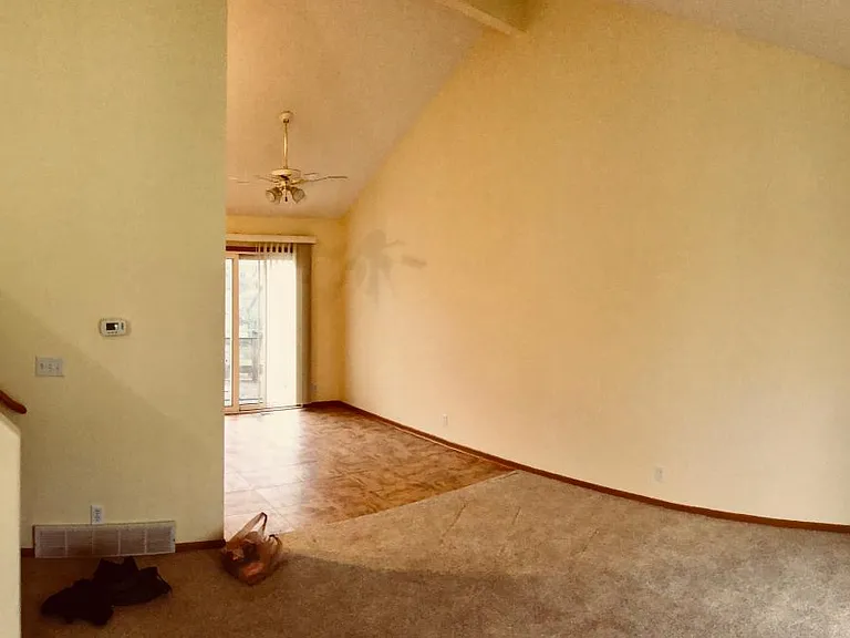 Newer carpet and open ceilings.
