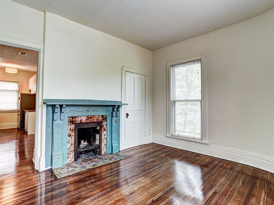 Charming fireplace in main level living room