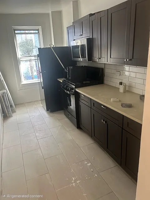 Building Photo - 2128 Hughes Ave #3