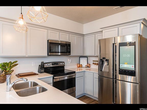4th image of 14487 S Quill Dr #H303