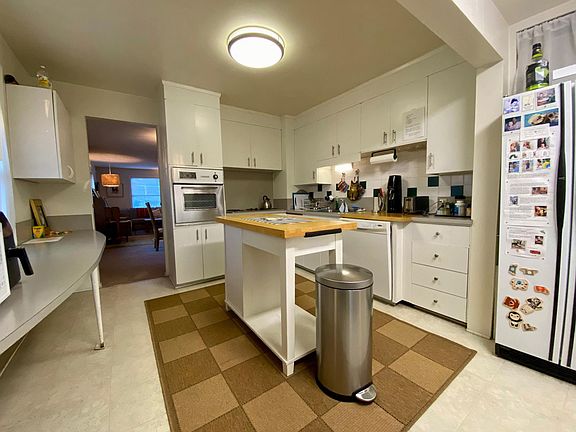 Very large kitchen! Butcher block island stays.