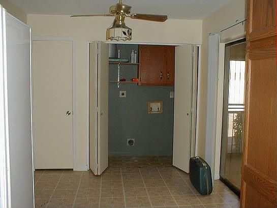 Washer/dryer area off garage